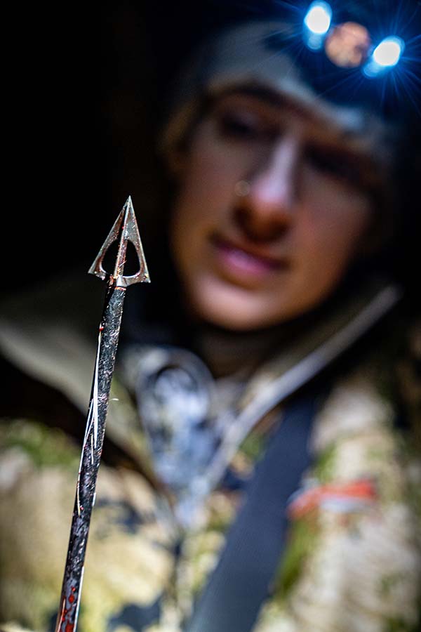 allie examining her arrow head