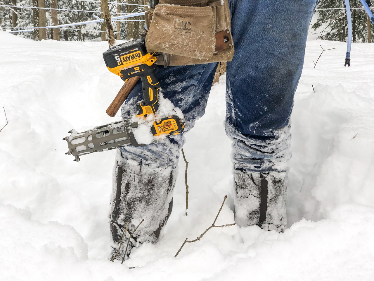 Drill used on trees and Muck boots in the snow