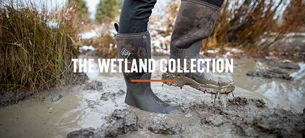 'The Wetland Collection' Wetland boots being worn while walking through extreme muddy water conditions.