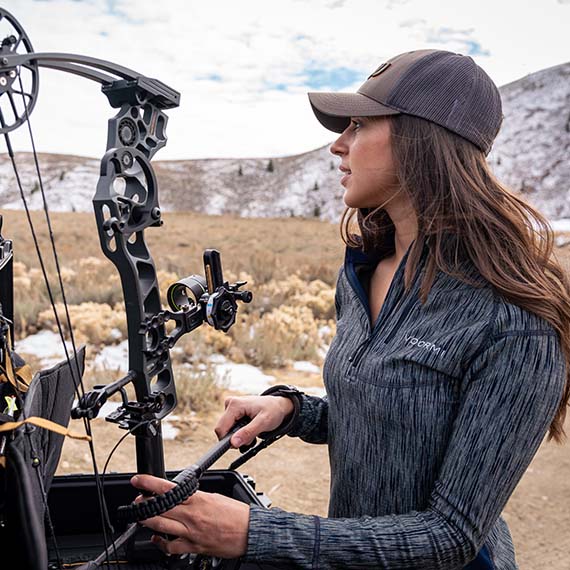 Allie getting her bow ready for the hunt.